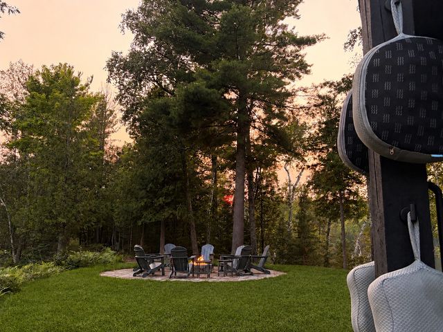 Fire pit in the pines at dusk