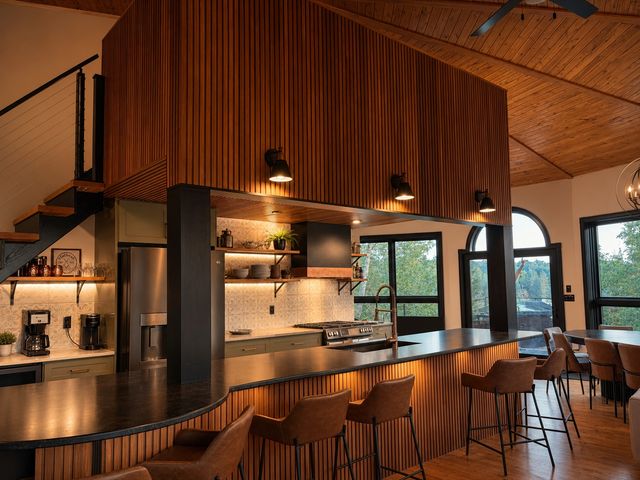 Kitchen and curved bar seating
